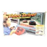 A Sega Action GT video driver, boxed. (AF)