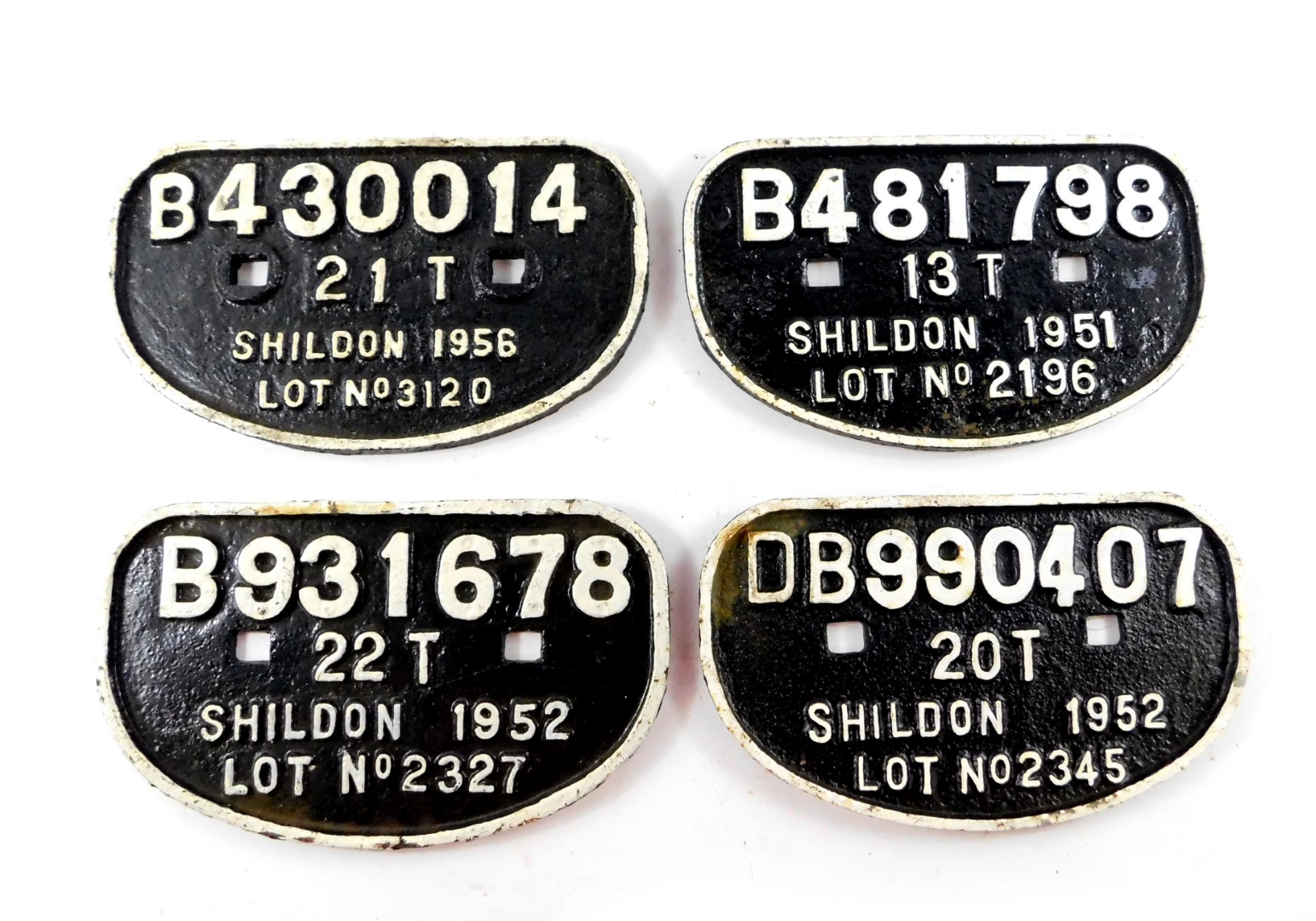 Four Shildon cast iron railway wagon plates, comprising DB990407 20T Shildon 1952 Lot No 2345,