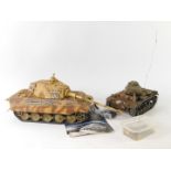 A Panzerkarpfwagen VI 'Konigstiger' radio controlled tank, 1:16 scale, together with another