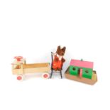 A child's wooden push-a-long truck, wooden ark, rocking Windsor doll's chair, and a Wendy Boston
