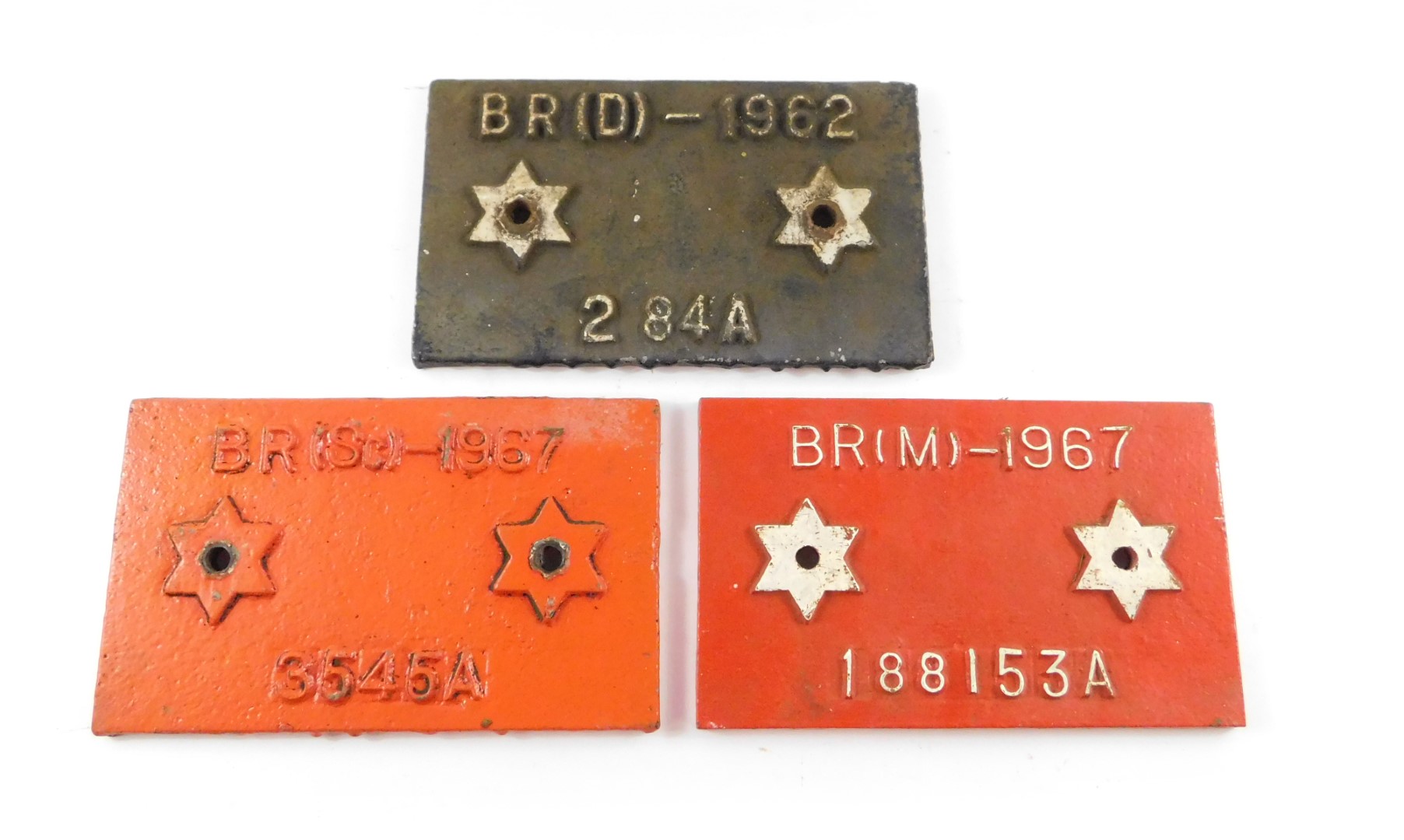 Three cast iron railway wagon plates, comprising BR (M) - 1967 188153A, BR (D) 1962, 284A, and BR (