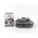 A radio controlled battle tank, modelled as a Walker Bulldog light tank U.S. M41A3, 1:16 scale, with