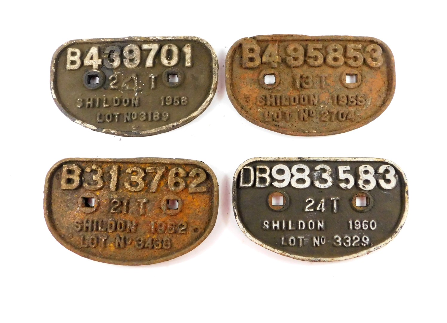 Four Shildon cast iron railway wagon plates, comprising DB983583 24T Shildon 1960 Lot No 3329,