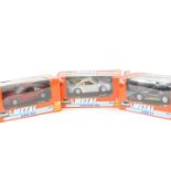 Three Revell die cast car models, 1:24 scale, comprising Porsche 959, 8604., BMW Z1, 8264., BMW