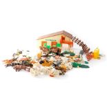 Britains plastic farm animals, further plastic animal figures, with farm house and accessories. (