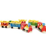 Two Fisher Price Circus Toy Trains (991), with carriages and animal cage wagons.