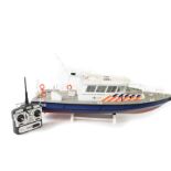 A kit built Korps Landelijke Politiedinsten P58 remote control model police boat, blue, white and