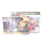 A Revell London Bus plastic model kit, 1:24 scale, and an Ertl AMT Star Wars Encounter with Yoda