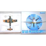 An Armour Collection 1:48 scale model of a BF109 Messerschmitt aeroplane, boxed.