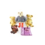 A Paddington Bear soft toy, with red wellington boots, a Merrythought Millennium Bear (boxed),