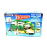 A Matchbox Thunderbirds Tracey Island electronic play set, with electronic rocket sounds and voices,