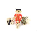 A Merrythought Beefeater Teddy Bear, 64cm H, two Dean's Limited Edition Bears, and three Millwheel