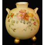 A Royal Worcester blush ivory globular vase, on bun feet, shape code 415, 1895, 9cm H. There is no