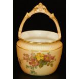 A Royal Worcester blush ivory circular cauldron, with over sailing handle, flower painted, shape