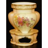 A Royal Worcester blush ivory vase, decorated with flower sprays below a Greek key gilt border, on