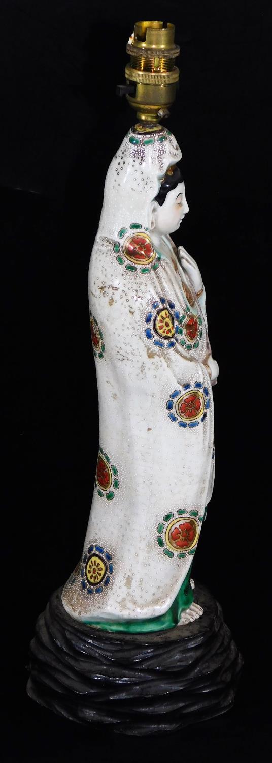 A 19thC Japanese Kutani figure of the Goddess Kannon, carrying a lotus bud, dressed in white robe, - Image 4 of 7