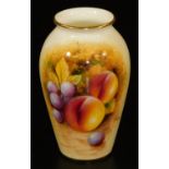 A Royal Worcester porcelain vase, of shouldered form, handpainted with autumnal fruits, shape no.