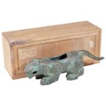 A bronze figure of a crouching tiger, in Chinese archaic style, 25cm W, with Japanese wooden box.