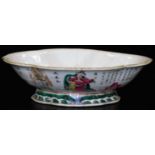 A 19thC Chinese porcelain lobed dish, decorated with mythical figures and calligraphy, predominantly