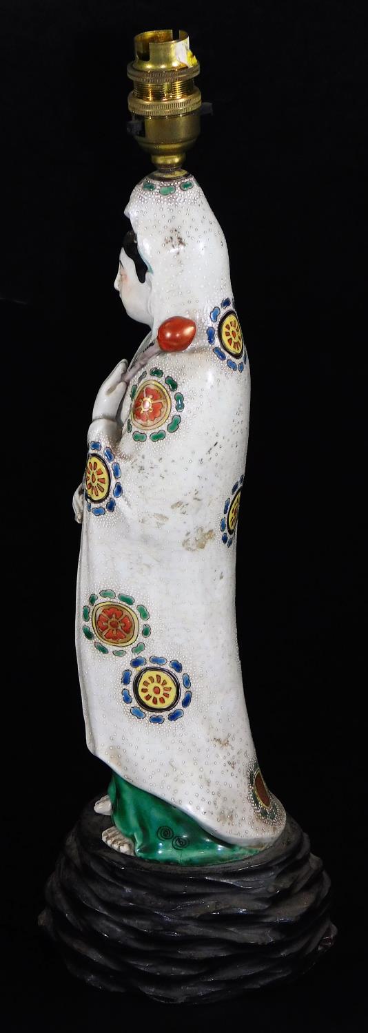A 19thC Japanese Kutani figure of the Goddess Kannon, carrying a lotus bud, dressed in white robe, - Image 2 of 7