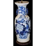 A large Chinese porcelain baluster vase, decorated in blue and white with a bird of prey,