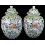 A fine and large pair of bulbous Chinese porcelain vases and covers, the bodies decorated with