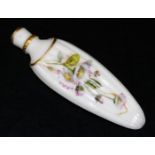 An early 20thC Royal Worcester porcelain perfume bottle, of shaped ribbed form handpainted with