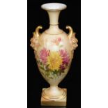 A Royal Worcester blush ivory tall satyr vase, decorated with flower groups, shape code 1716,