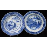 Two 18thC Chinese blue and white dishes, with shallow interior, profusely decorated with flowers and