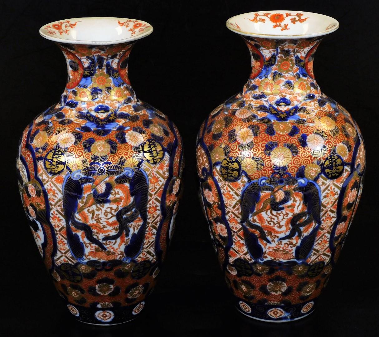 A pair of Meiji period Japanese Imari vases, each of baluster form, profusely decorated with panels, - Image 4 of 6