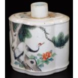 A Chinese porcelain tea caddy, of lobed oval form, decorated with scenes, exotic birds, buildings