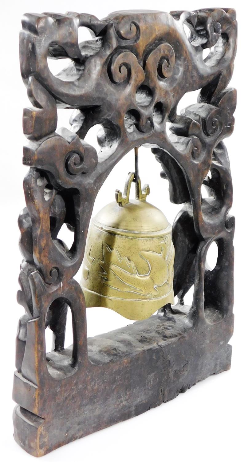 A heavily carved Chinese 19thC dinner gong, the shaped stand carved with exotic birds, pierced - Image 4 of 5