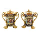 A pair of 19thC Vienna porcelain tyg vases, each of inverted cylindrical form, with floral scroll