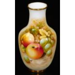 A Royal Worcester porcelain vase, of shouldered form, handpainted with grapes and apples, shape