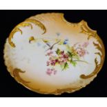 A Royal Worcester blush ivory plate, decorated with flowers and insects, shape code 1427, c1900,