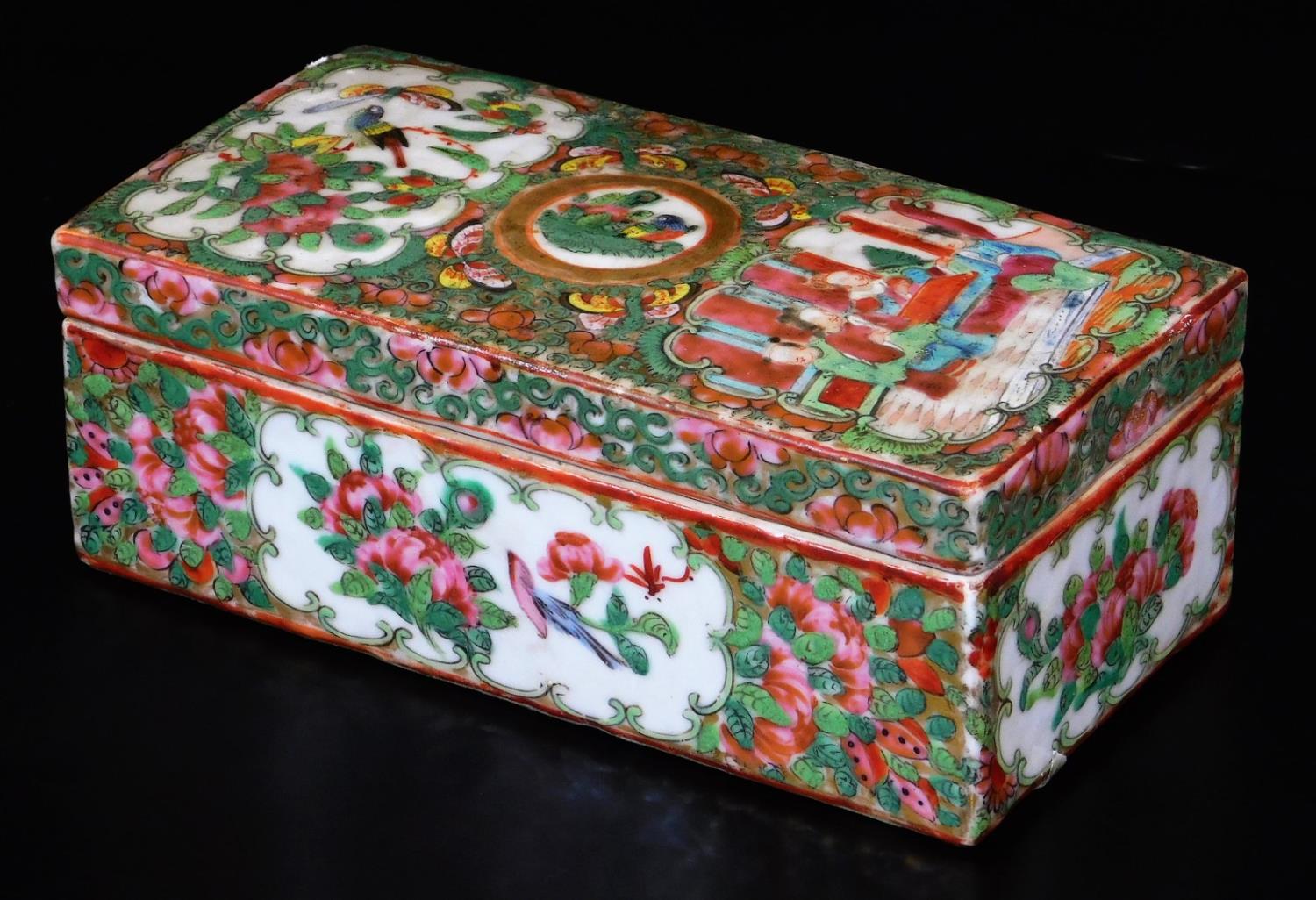 A 19thC Cantonese pen box of rectangular form, typically decorated with flowers and panels of