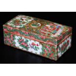A 19thC Cantonese pen box of rectangular form, typically decorated with flowers and panels of