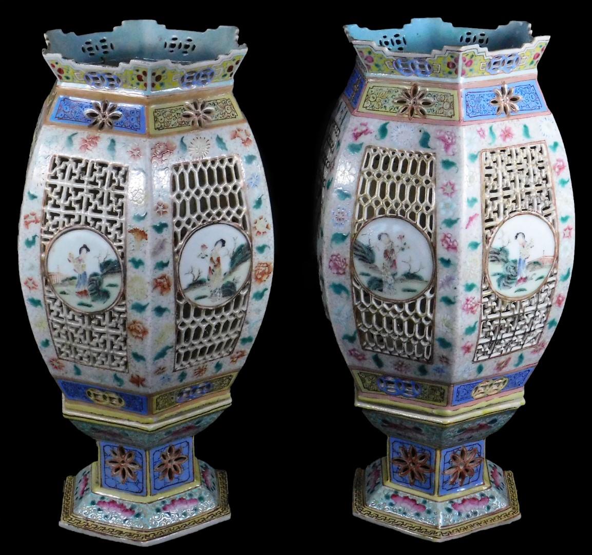 A fine pair of Chinese reticulated porcelain table lanterns, each of octagonal globular form, the