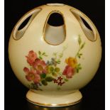 A Royal Worcester blush ivory pierced circular potpourri vase, decorated with flowers, shape code