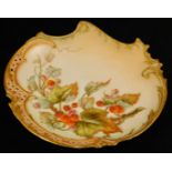A Royal Worcester blush ivory plate, decorated with red currants with a pierced border, shape code