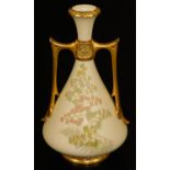 A Royal Worcester blush ivory two handled vase, decorated with tooled ferns, shape code 1021, puce