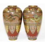 A fine pair of Meiji period Japanese cloisonne enamel vases, decorated with bands of four clawed