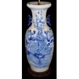 A large Chinese blue and white porcelain baluster vase, decorated with peacock, prunus and