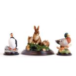 A Country Artists figure group Rabbit Family, CA554, and two others, Duck and Puffin, 7cm H. (3)