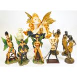 Various resin figures, nude imp and fairy figures, 29cm H, one of a nude figure tied to a tree, othe