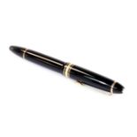 A Montblanc 146 Meisterstuck fountain pen, in black with gilt coloured clip and star to the lip top