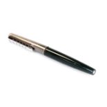 A Montblanc fountain pen, the lid marked Carrera in green and polished steel colours, with graduate