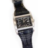 A Police wristwatch, with 4cm W rectangular dial with baton and Arabic numerals, with date aperture