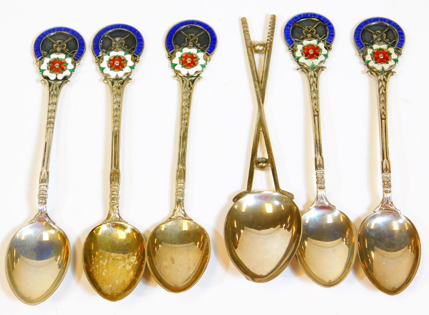 A set of five Elizabeth II silver and enamel golfing teaspoons, set with floral heads for Sutton Col