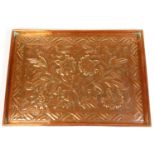A Keswick School of Industrial Art embossed copper tray, of rectangular design with plain raised gal